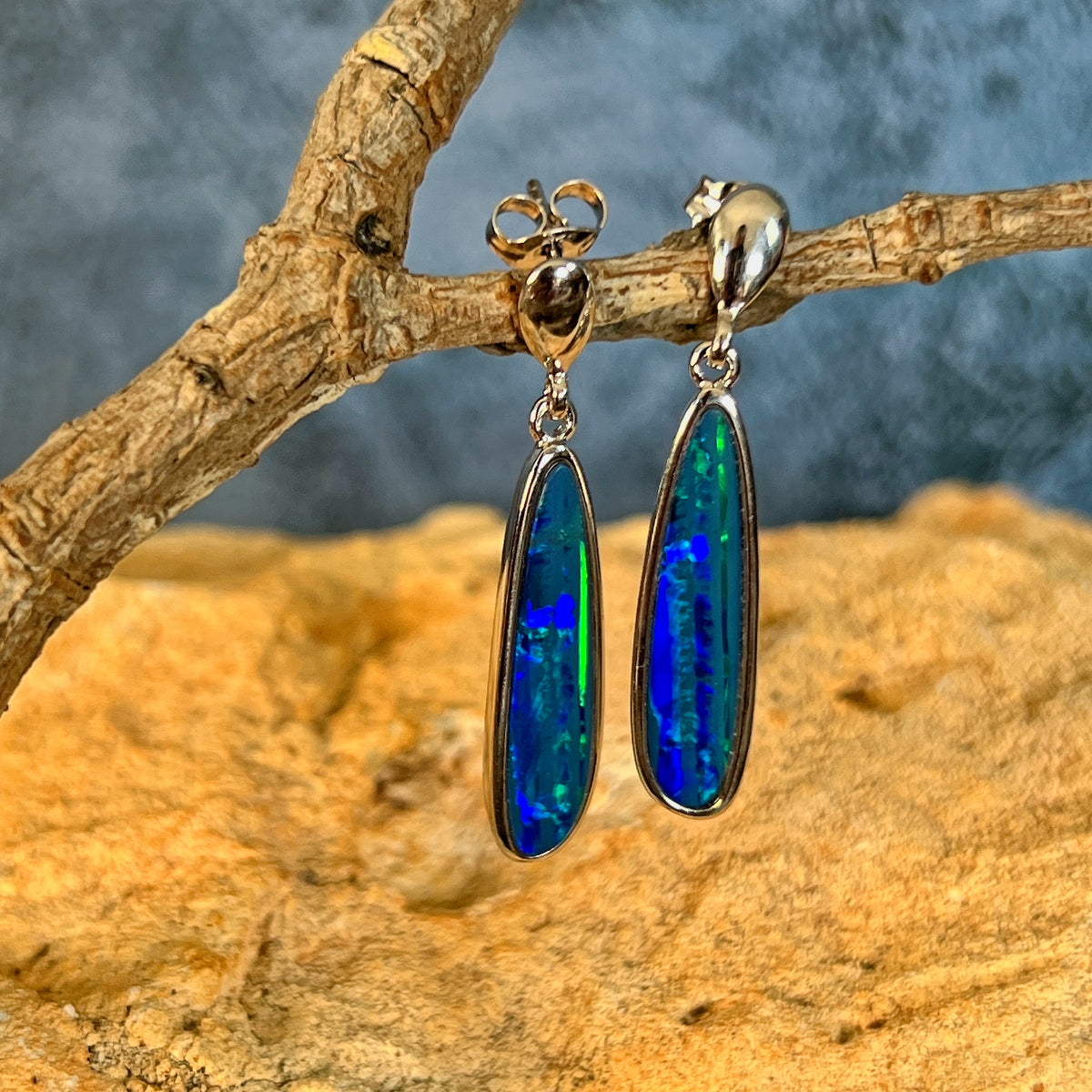 23 x 6mm Australian opal doublet earrings in sterling silver, green and blue