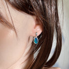 12 x 8.5mm freeform Australian opal doublet earrings worn on the ear, sterling silver