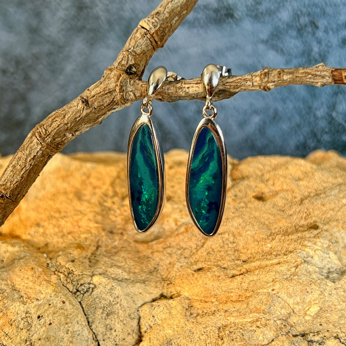 blue and green play-of-colour in 24 x 8mm freeform Australian opal doublet earrings