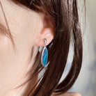 24 x 8mm freeform Australian opal doublet earrings worn on the ear, sterling silver