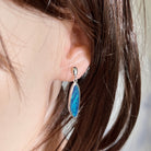 Australian opal doublet earrings worn on the ear, sterling silver, 24 x 8mm freeform stones