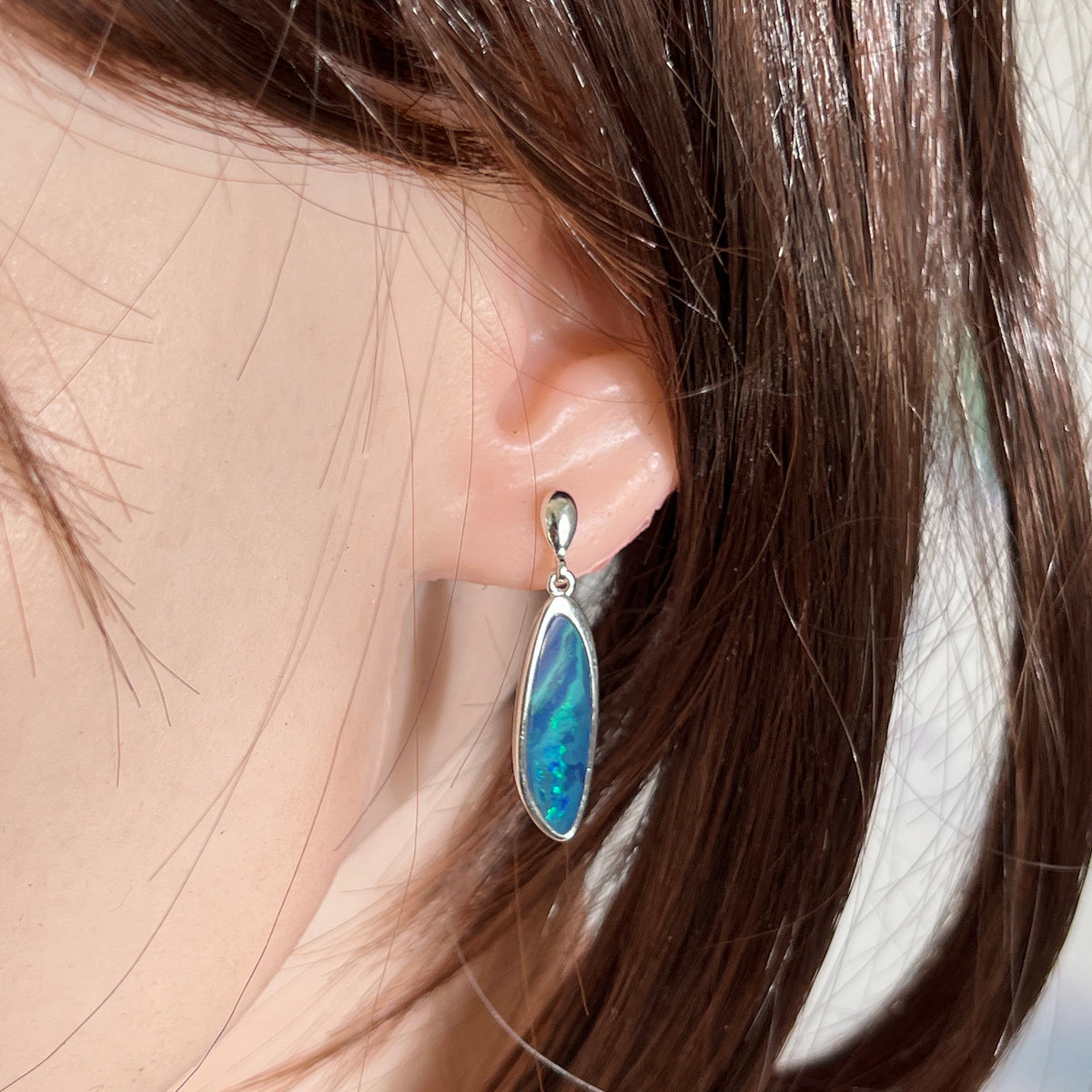freeform Australian opal doublet earrings worn, sterling silver, blue and green