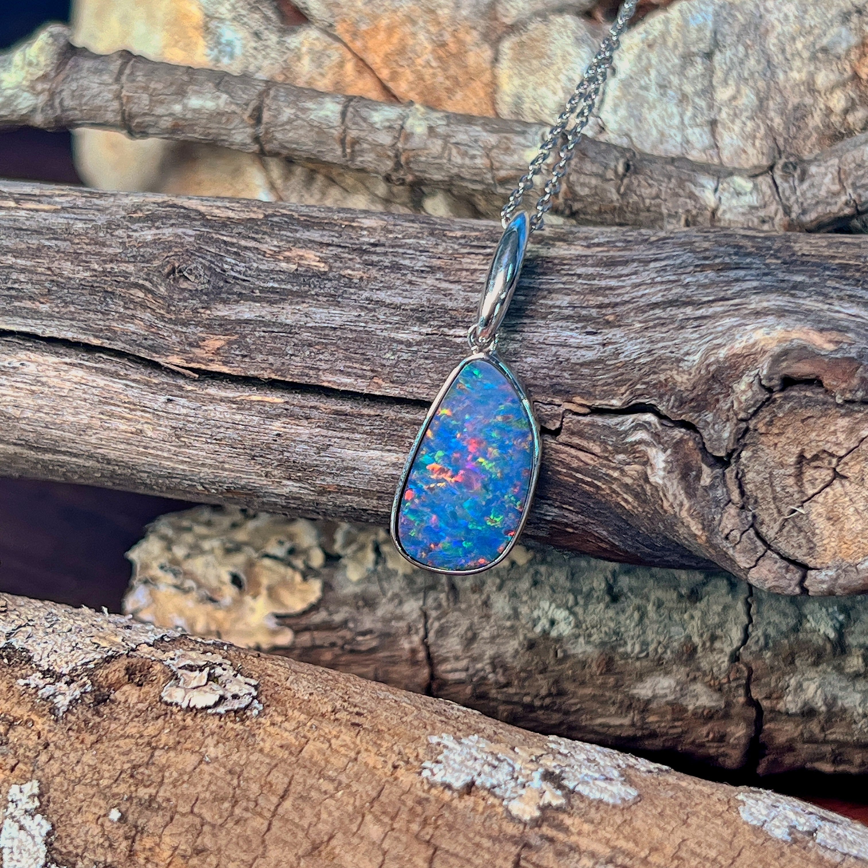 Blue and red opal doublet pendant necklace in sterling silver on a fine chain