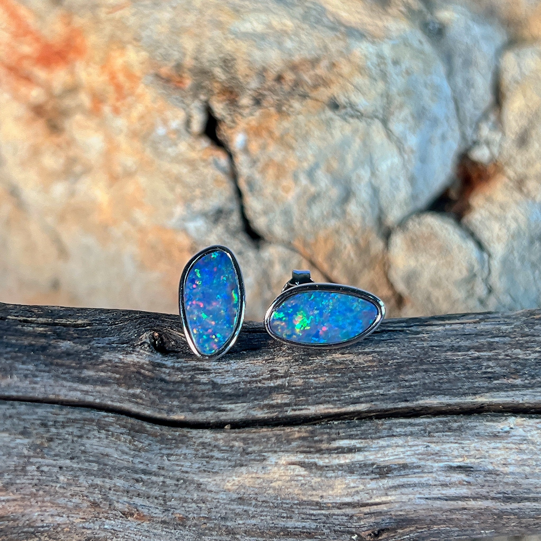 freeform Australian opal doublet earrings in sterling silver, red, blue, yellow and green play-of-colour