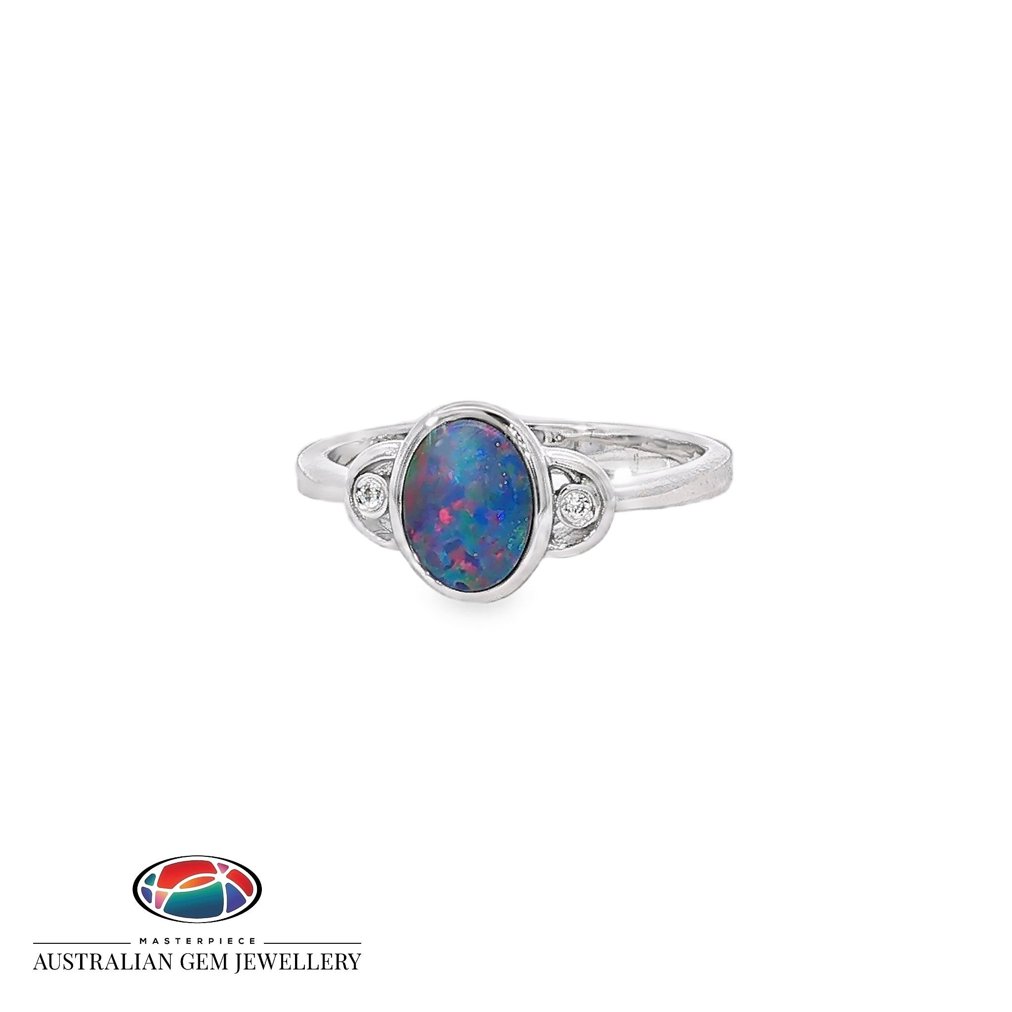 Oval opal doublet ring in sterling silver, bezel set with a cubic zirconia to each side, showing blue, red and green play of colour