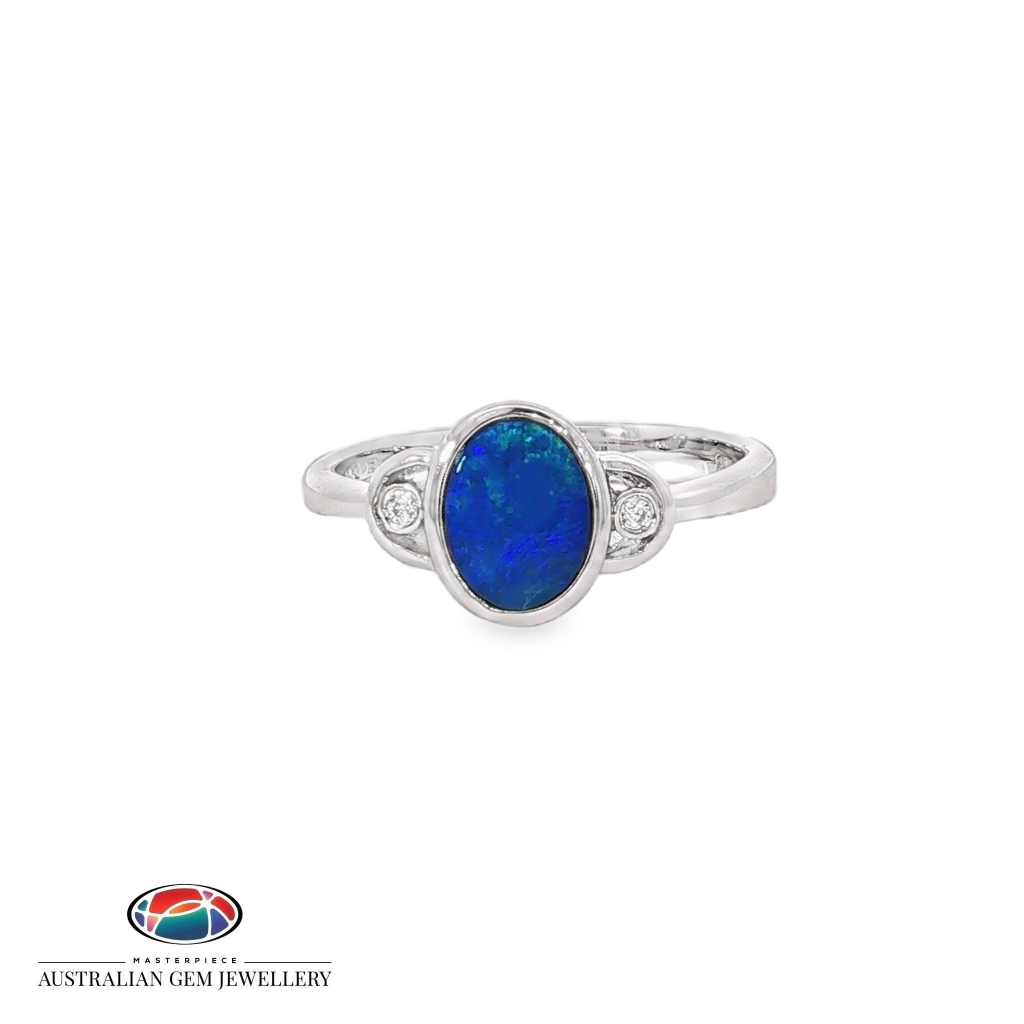 Oval opal doublet ring in sterling silver, bezel set with a cubic zirconia to each side, in blue and green