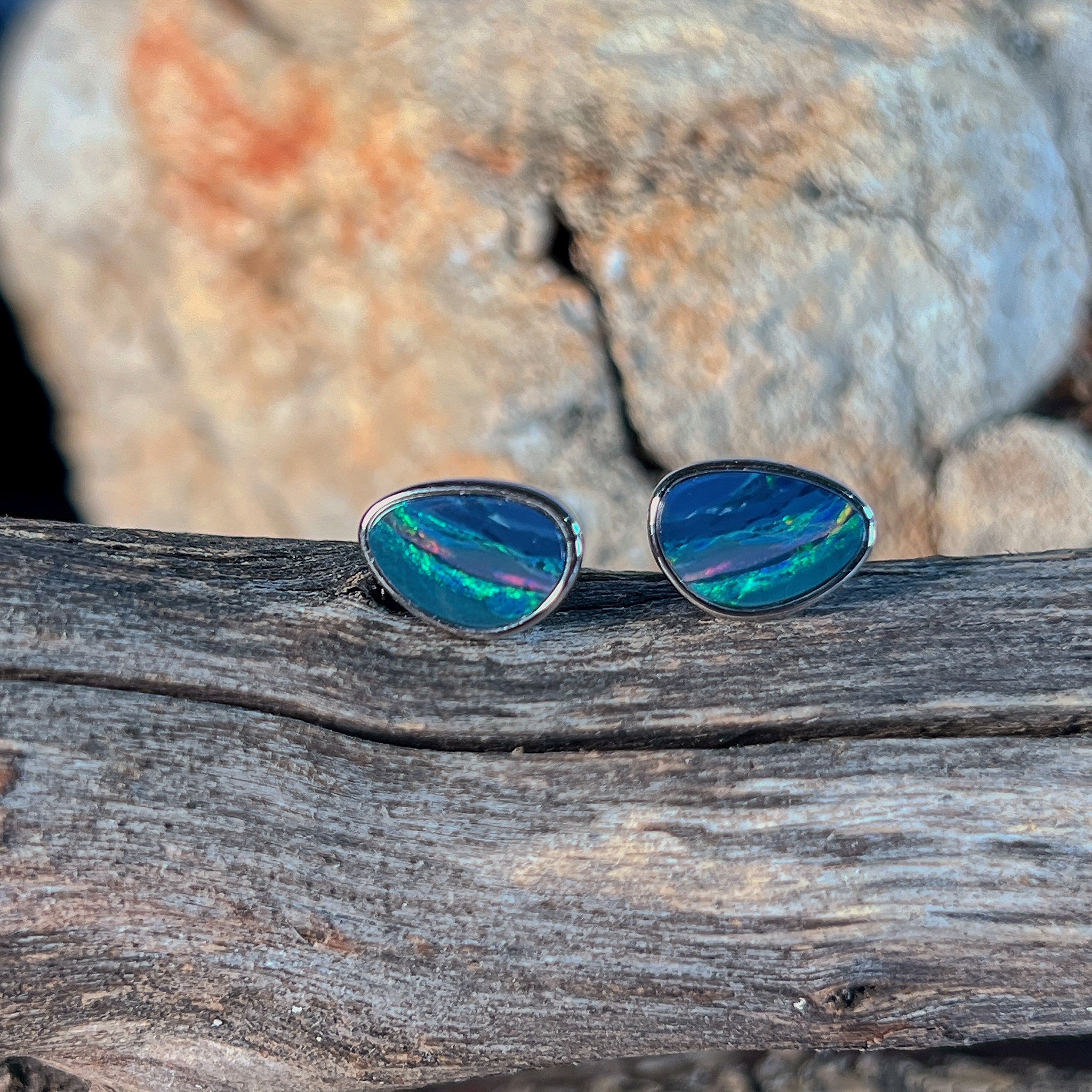 Australian opal doublet earrings, sterling silver, 10 x 7mm stones showing red, blue and green