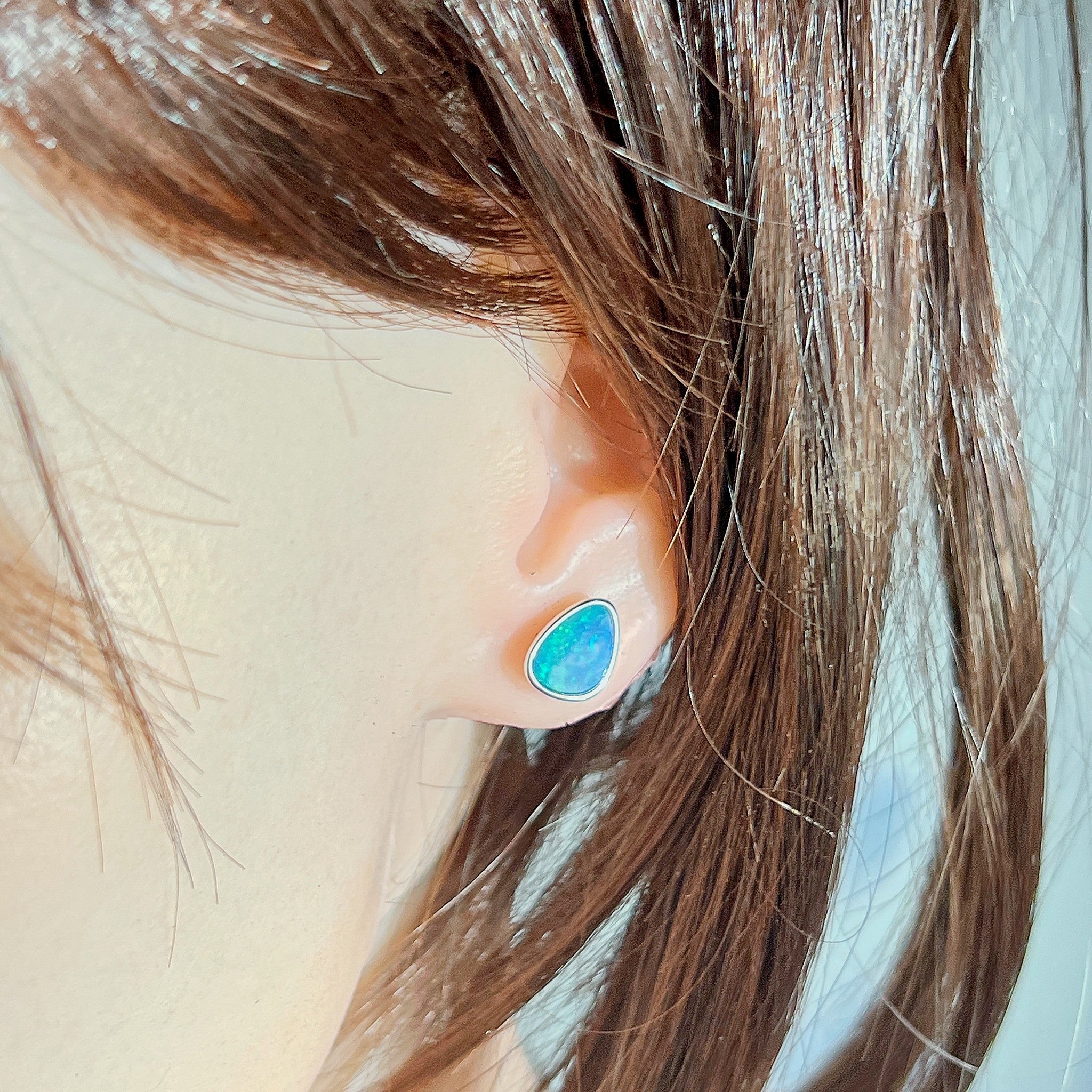 Worn Australian opal doublet earrings in sterling silver, blue and green, 10 x 8mm