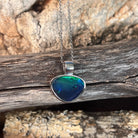 blue and green play-of-colour in a 12 x 15mm freeform Australian opal triplet pendant