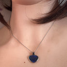 12 x 15mm freeform Australian opal triplet pendant worn at the neck, sterling silver