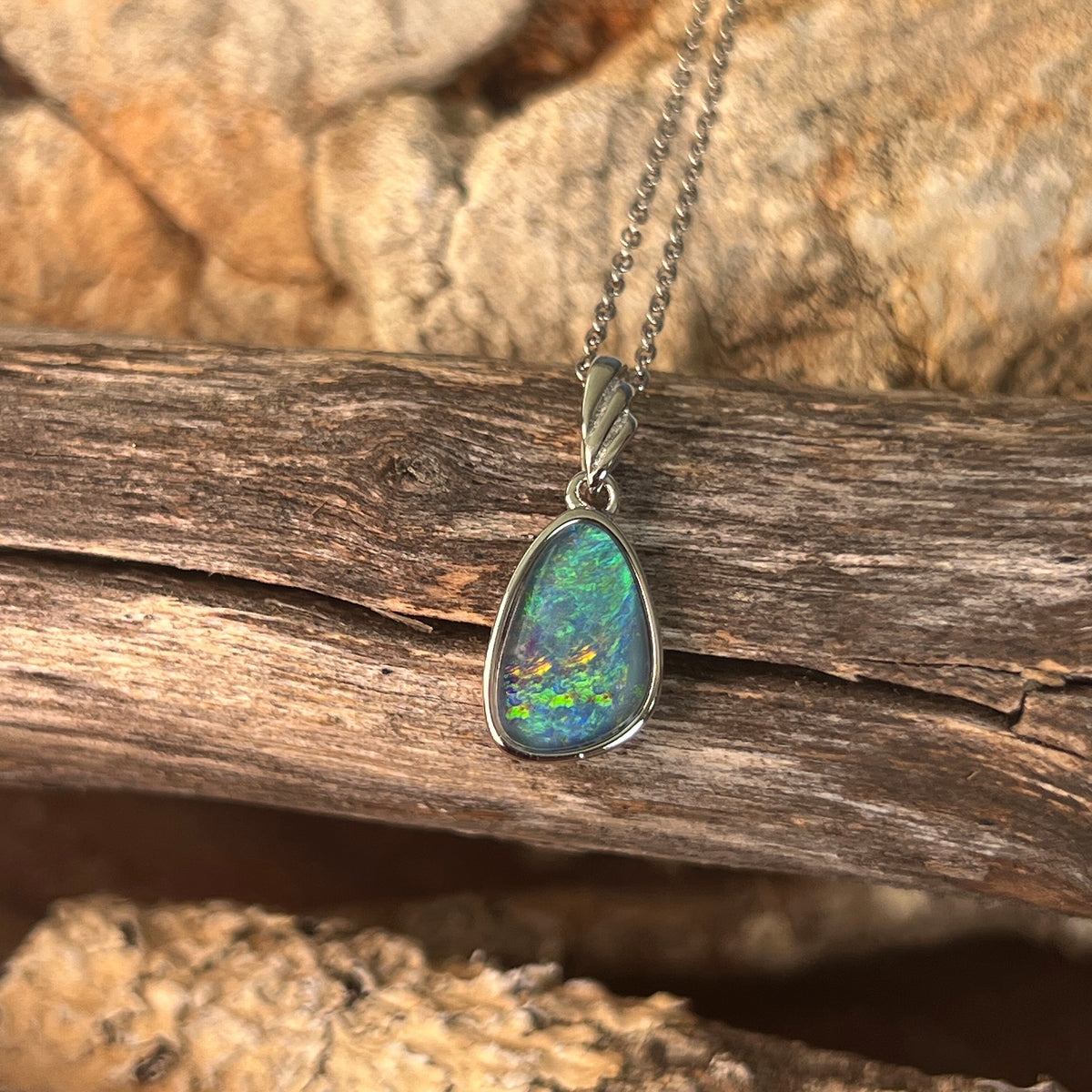 12 x 8mm Australian opal triplet pendant in sterling silver, blue, green and yellow