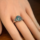 oval Australian opal triplet ring in sterling silver, worn on the hand