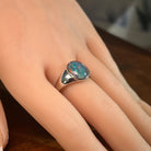 Australian opal triplet ring in sterling silver worn, oval stone, size US 10