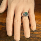 rectangular Australian opal triplet ring worn, sterling silver, yellow, blue and green