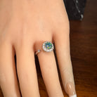 7mm round Australian opal triplet ring on the hand, sterling silver