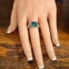 cushion-shaped Australian opal triplet ring in sterling silver, worn on the hand