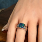 10 x 10mm cushion-shaped Australian opal triplet ring on the hand, sterling silver