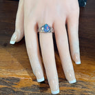 Worn Australian opal triplet ring in sterling silver, red, blue and green, 12 x 9mm