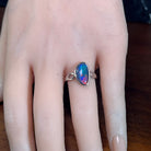 13 x 8mm triangular Australian opal triplet ring on the hand, sterling silver