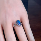 Australian opal triplet ring in sterling silver worn, triangular stone, size US 6.5