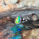 triangular Australian opal triplet ring in sterling silver, red, yellow, blue and green play-of-colour