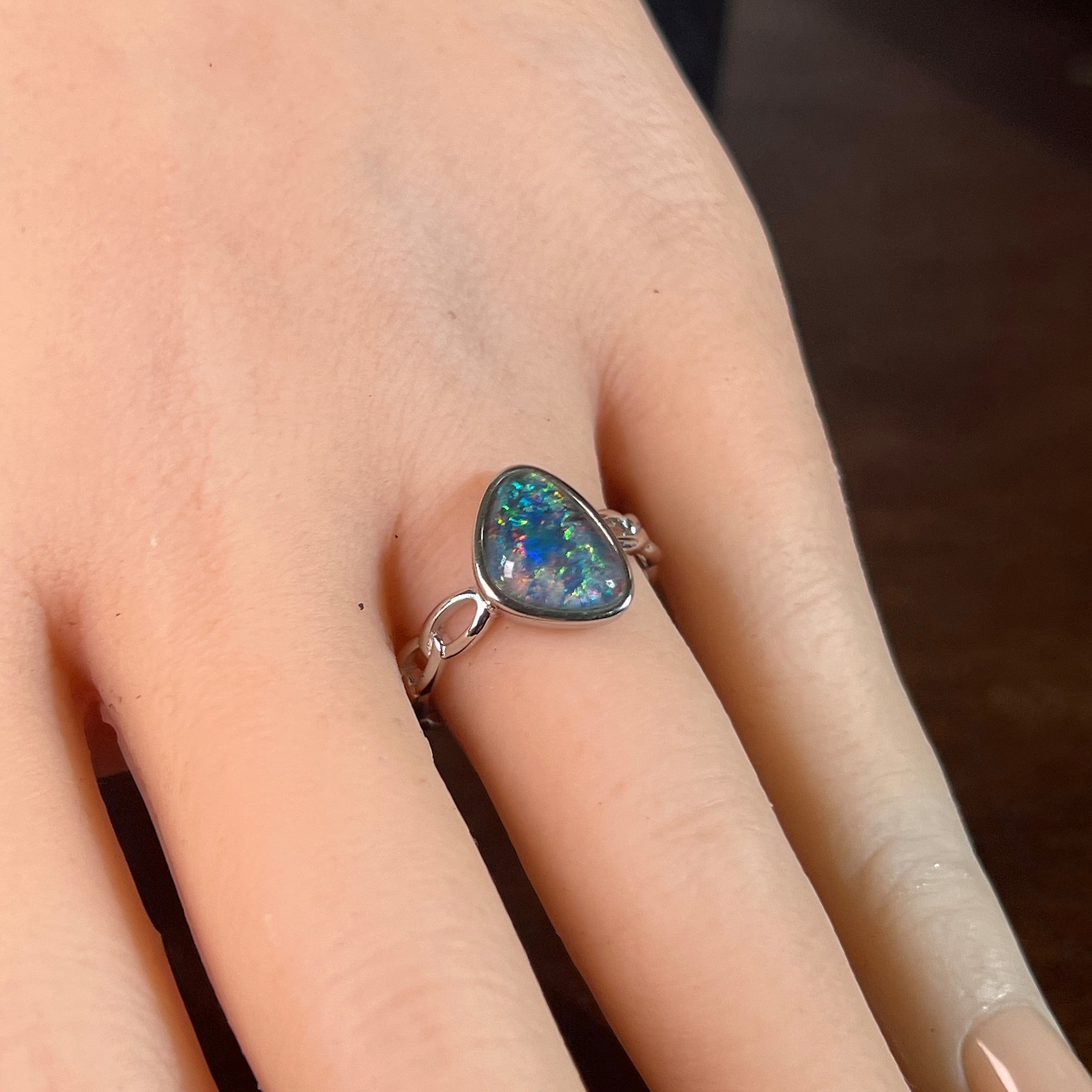 Australian opal triplet ring in sterling silver worn, triangular stone, size US 6