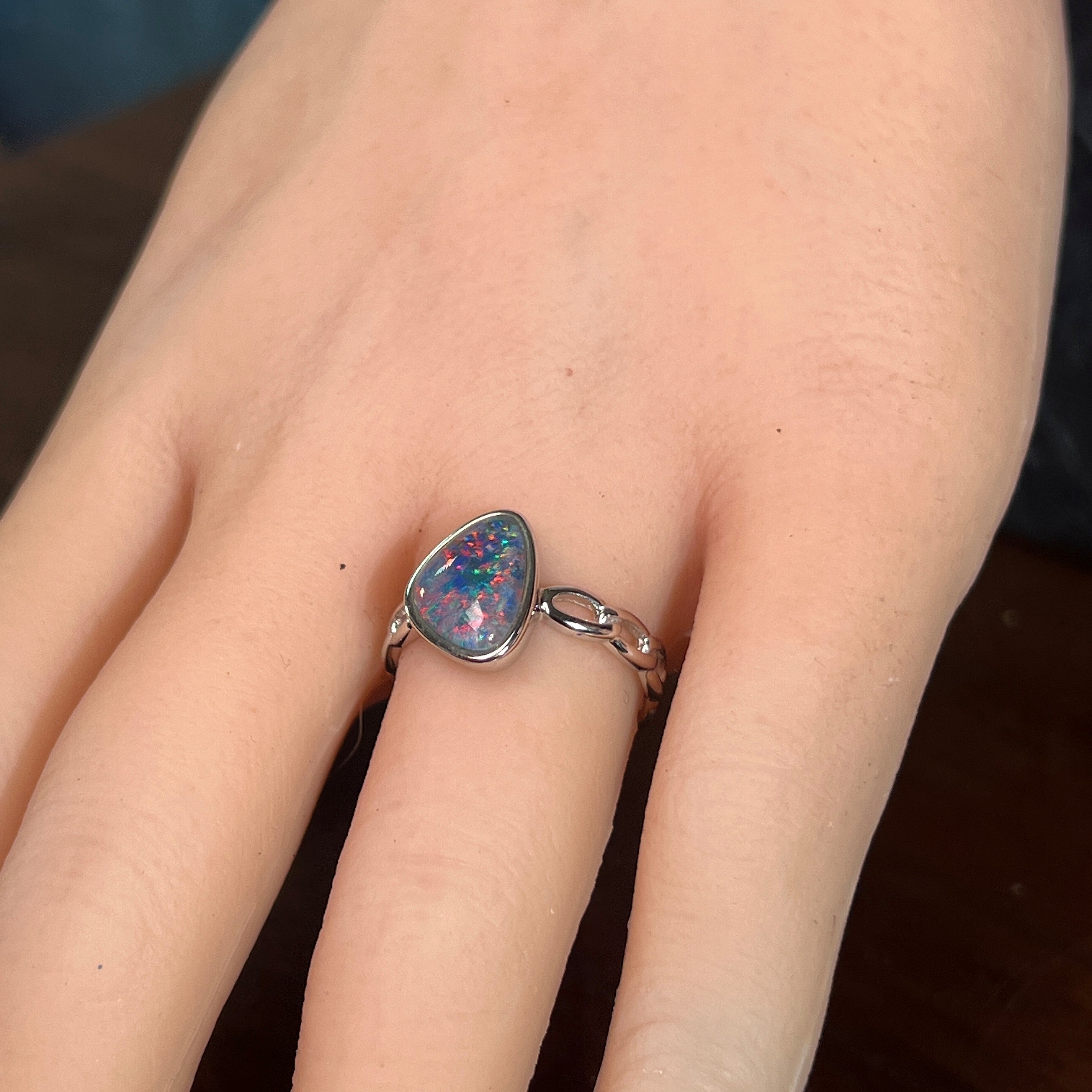 Worn Australian opal triplet ring in sterling silver, red, blue and green, 11 x 9mm