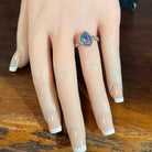 Australian opal triplet ring on the hand, sterling silver, 11 x 9mm triangular stone