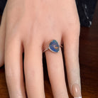 Worn Australian opal triplet ring in sterling silver, yellow, orange, blue and green, 12.5 x 9.5mm