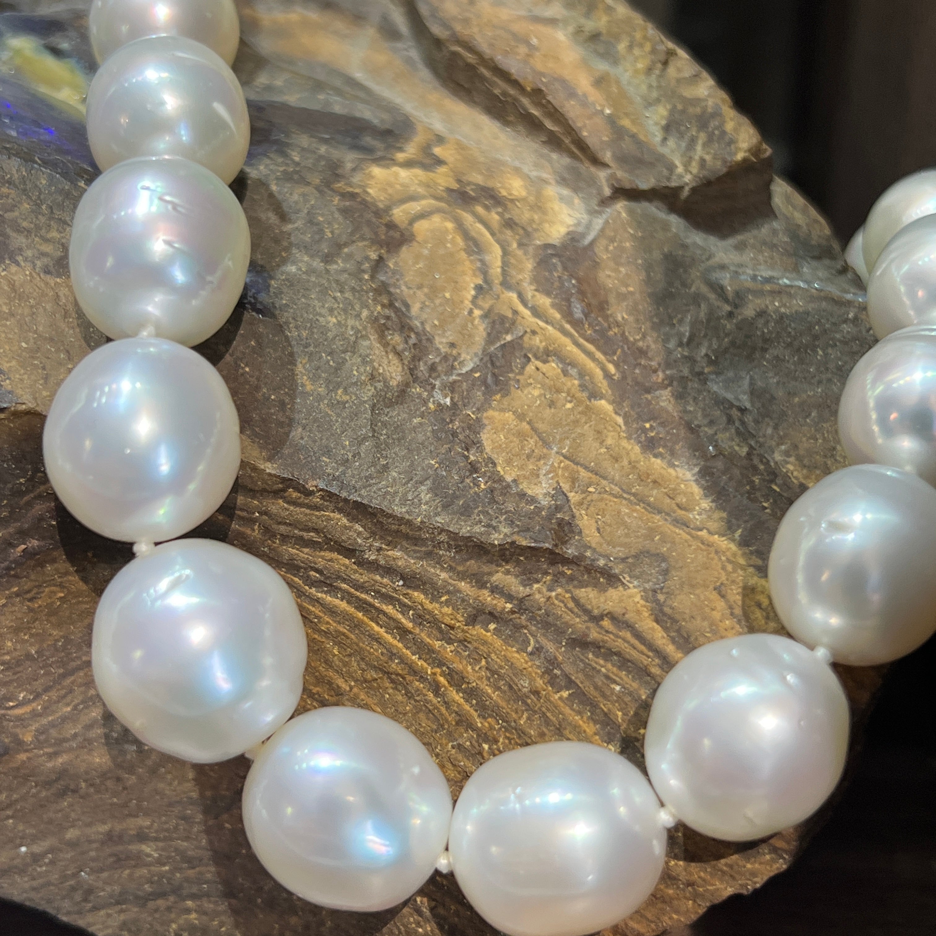 Close view of the white South Sea pearl strand, 12.4-15.9mm cultured pearls graduating in size