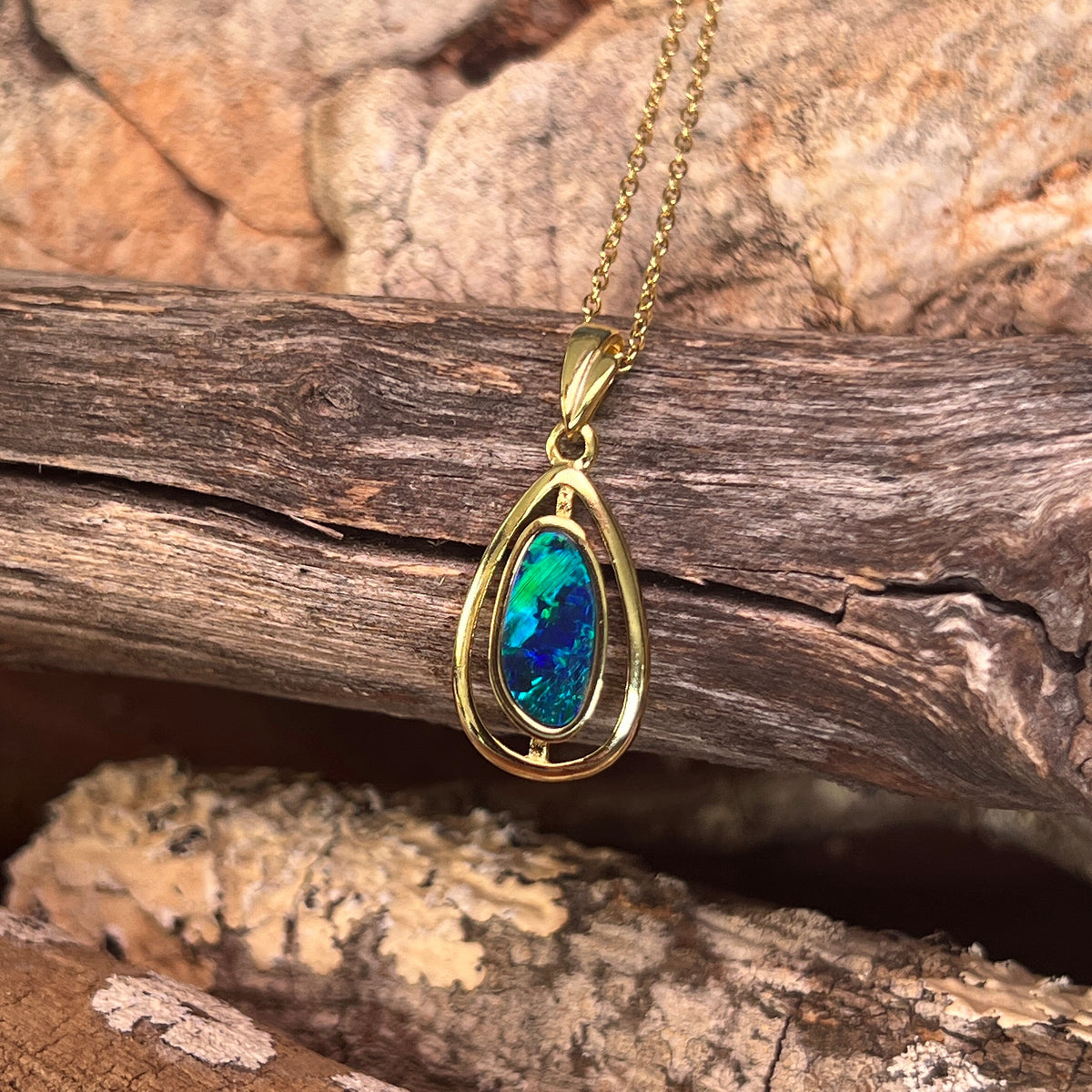 yellow gold-plated silver Australian opal doublet pendant with an 11.5 x 5.5mm freeform stone