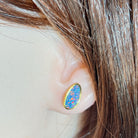 Australian opal doublet earrings worn on the ear, yellow gold-plated silver, 12 x 6mm freeform stones