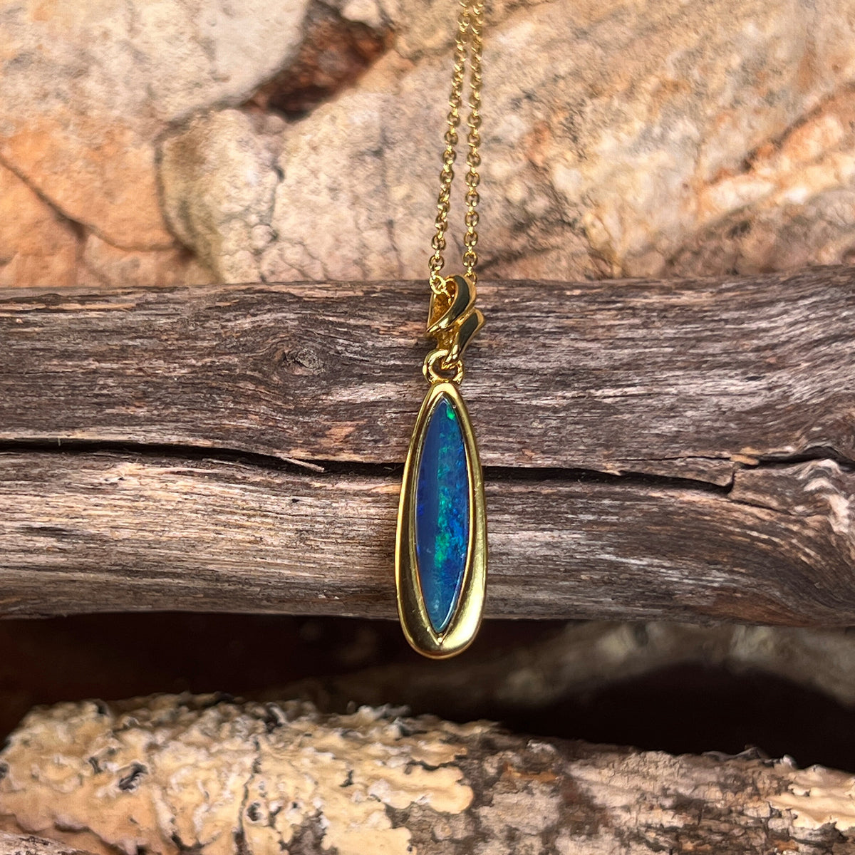 yellow gold-plated silver Australian opal doublet pendant with a 17 x 5mm marquise stone
