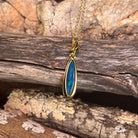 Australian opal doublet pendant, yellow gold-plated silver, 17 x 5mm stone showing blue and green