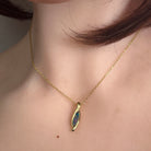 marquise Australian opal doublet pendant in yellow gold-plated silver, worn at the neck