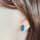 Worn Australian opal doublet earrings in yellow gold-plated silver, blue and green, 11.5 x 7.5mm
