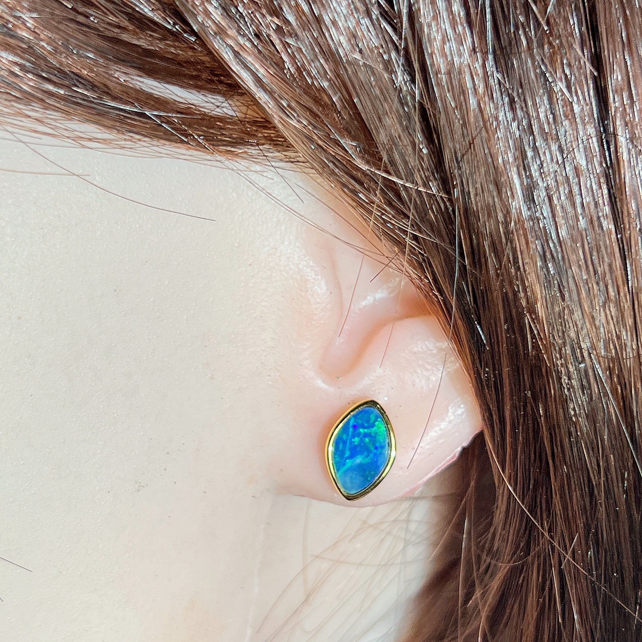 Worn Australian opal doublet earrings in yellow gold-plated silver, blue and green, 11.5 x 7.5mm