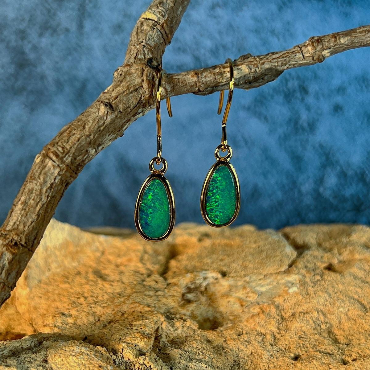 Australian opal doublet earrings, yellow gold-plated silver, 11 x 6mm stones showing green and yellow