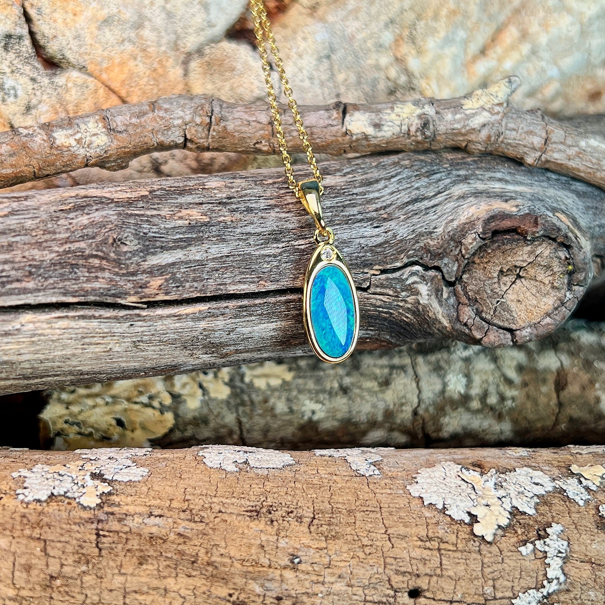 yellow gold-plated silver Australian opal doublet pendant with a 12 x 6.5mm oval stone