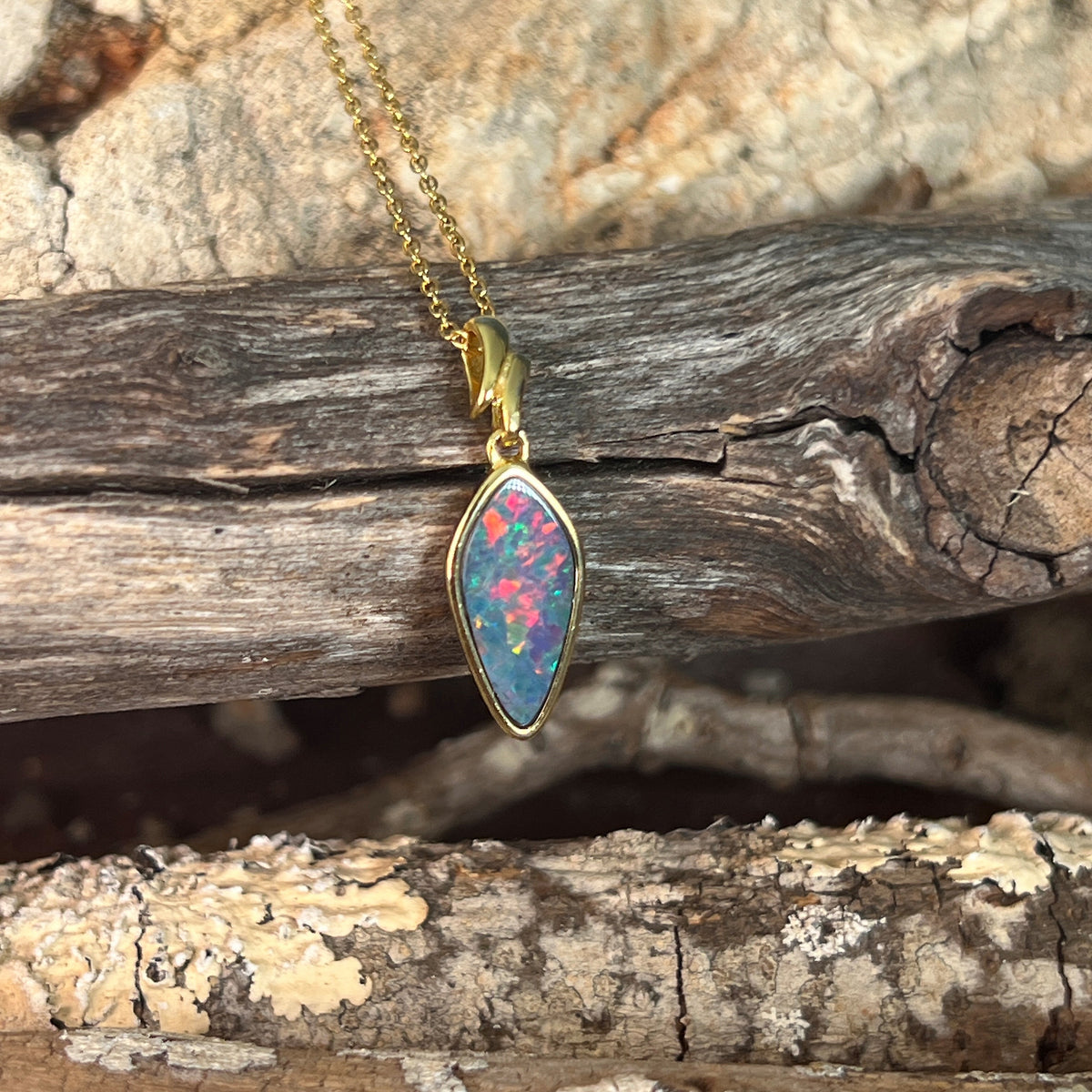 yellow gold-plated silver Australian opal doublet pendant with a 16 x 8mm oval stone