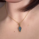 Worn Australian opal doublet pendant in yellow gold-plated silver, red, blue and green, 16 x 8mm