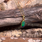 yellow gold-plated silver Australian opal doublet pendant with a 12 x 6mm oval stone