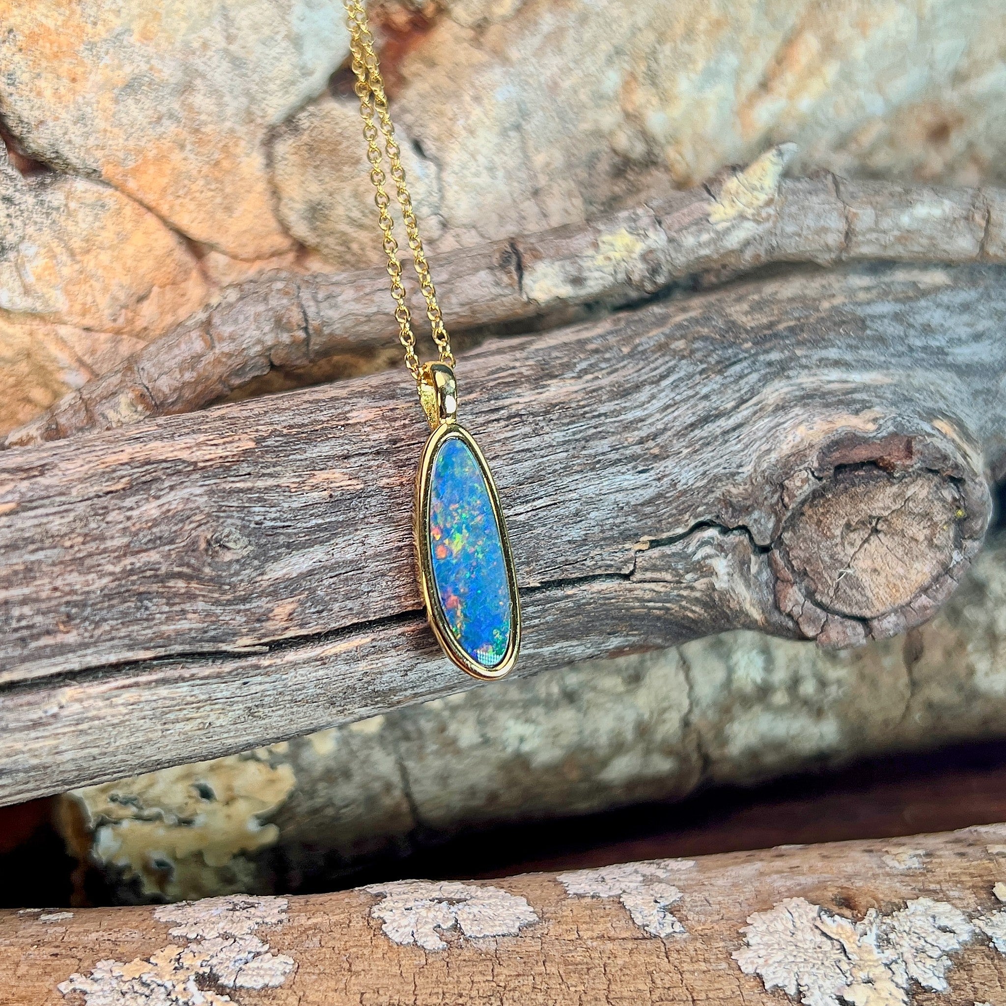 yellow gold-plated silver Australian opal doublet pendant with a 17 x 6mm pear-shaped stone