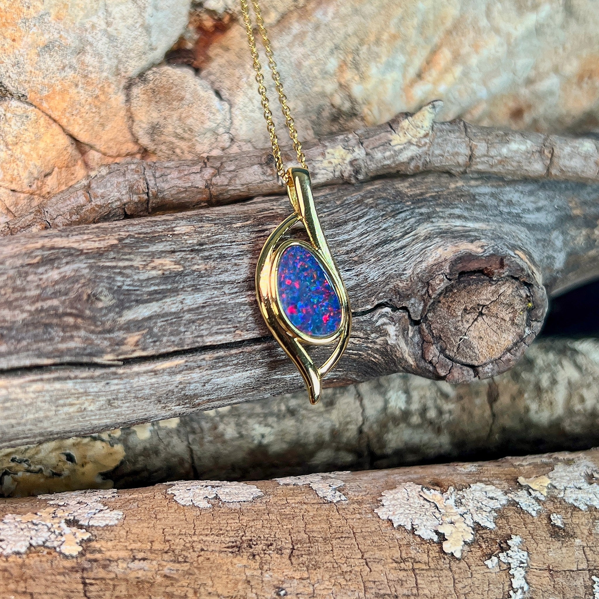 yellow gold-plated silver Australian opal doublet pendant with a 12 x 8mm pear-shaped stone