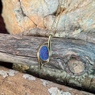 red and blue play-of-colour in a 12 x 8mm pear-shaped Australian opal doublet pendant