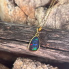 Australian opal triplet pendant, yellow gold-plated silver, 11 x 8mm stone showing red, green and blue