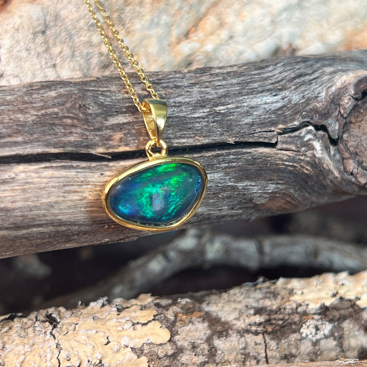 yellow gold-plated silver Australian opal triplet pendant with a 16 x 10mm freeform stone