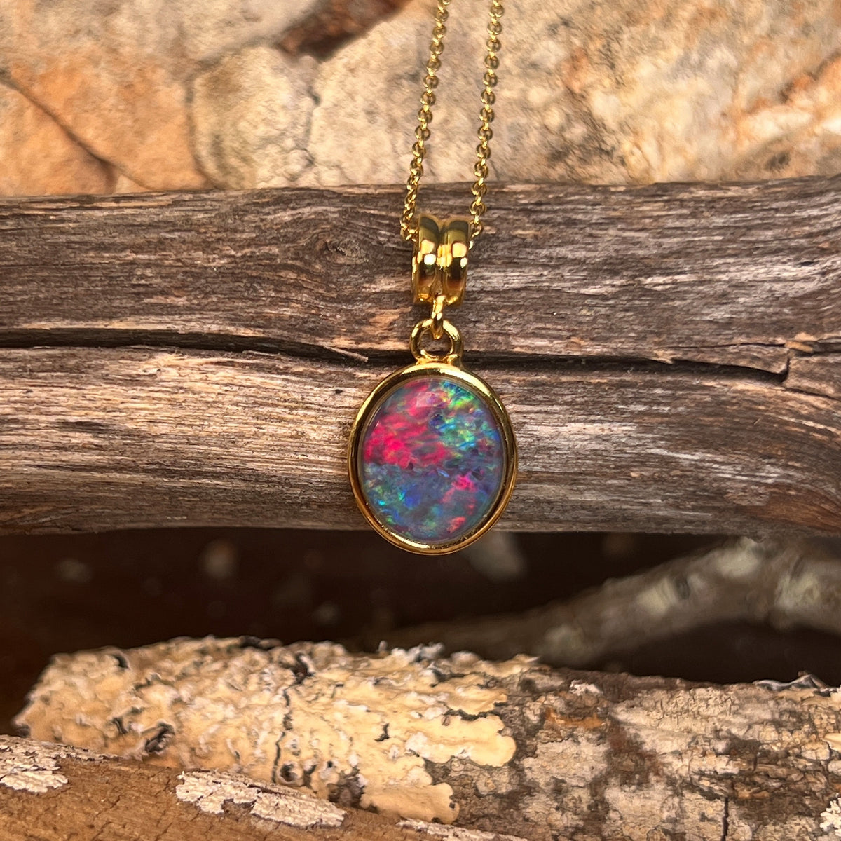 yellow gold-plated silver Australian opal triplet pendant with a 14 x 10mm oval stone