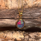 Australian opal triplet pendant, yellow gold-plated silver, 14 x 10mm stone showing blue, red and green
