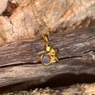 blue, red and green play-of-colour in a 5mm round Australian opal triplet pendant